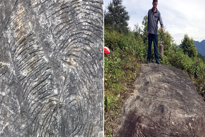 Hai khối đá khắc cổ trên núi Dở Trú Chế Nhù, thôn Hú Trù Lình, xã Lao Chải, huyện Mù Cang Chải